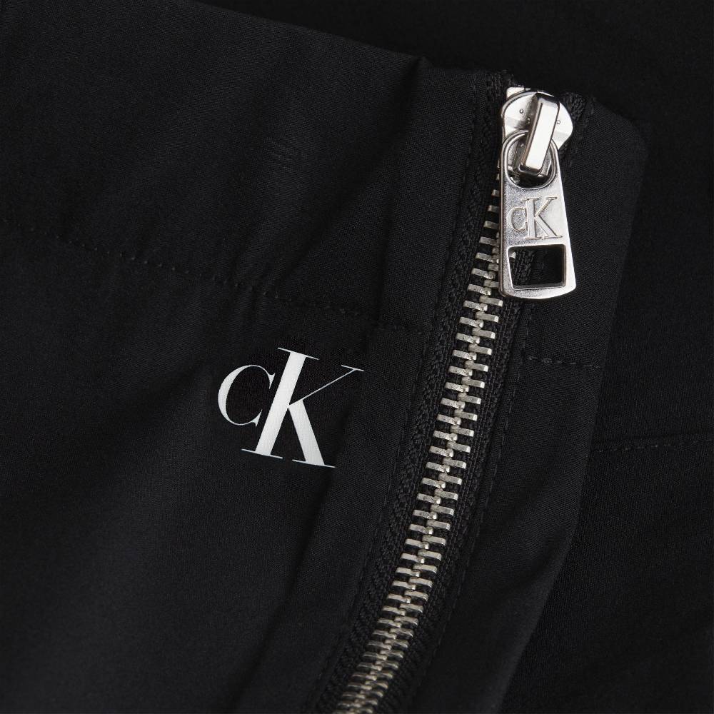 CALVIN KLEIN  Pantaloni Slim Vita Alta Calvin Klein in Nylon Riciclato Italia
